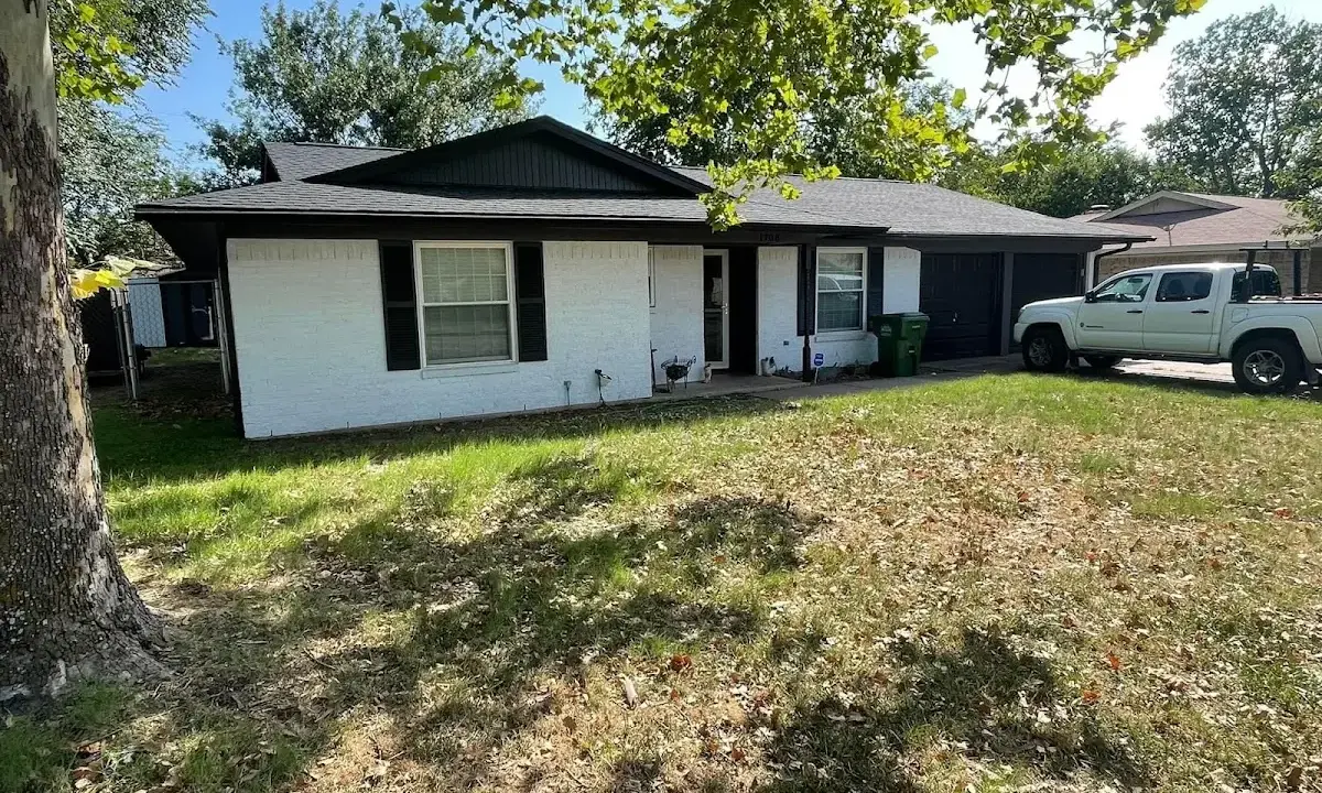 Professional roofing crew working on a residential roof in Jupiter